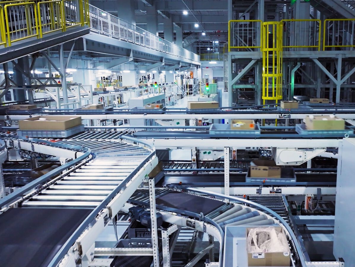 a factory filled with lots of machines and boxes